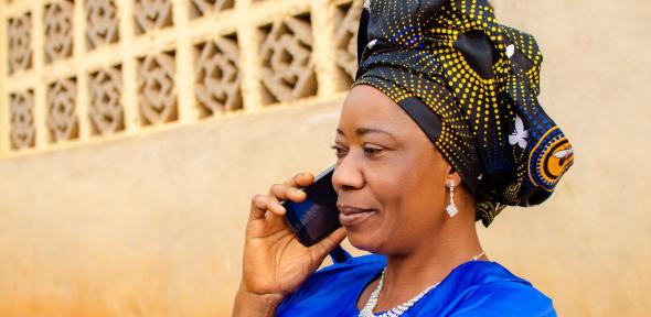 Nigerian women using mobile phone